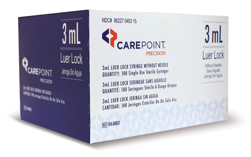 A blue and white box of CarePoint precision Luer lock syringes without needles