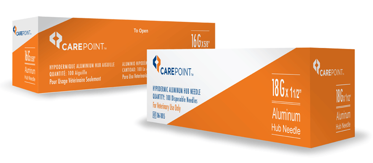 Two orange and white boxes containing CarePoint aluminum hub needles